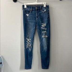 American Eagle Distressed Super Stretch X Skinny Jeans Medium Wash Size 4